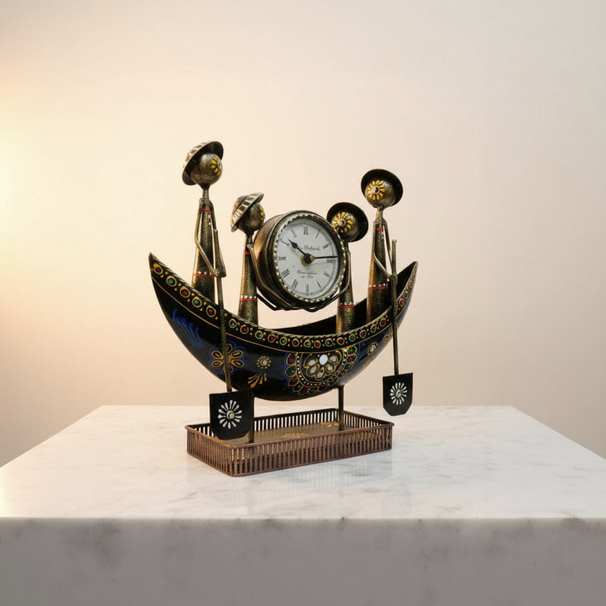 Decorative clock shaped like a gondola on a white background