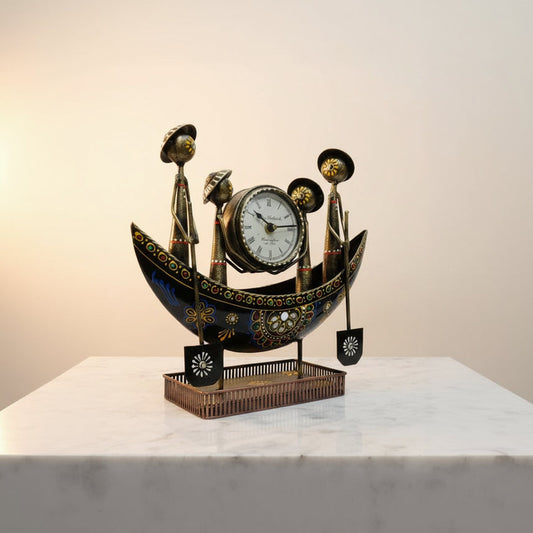 Decorative clock shaped like a gondola on a white background