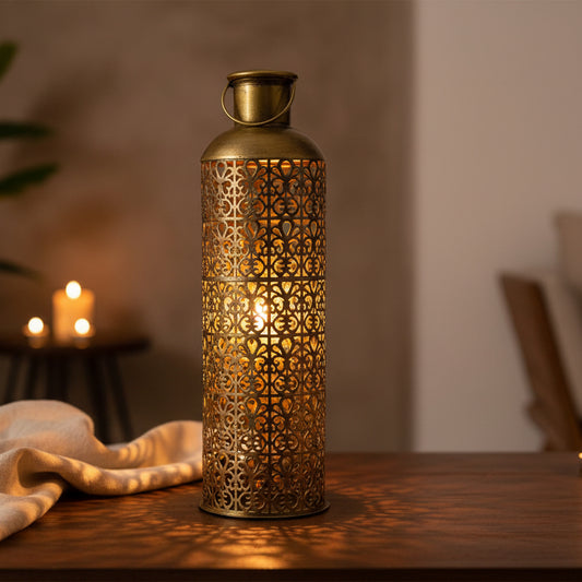Decorative brass lantern with intricate cut-out patterns