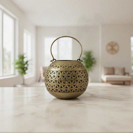 Decorative brass lantern with intricate patterns 